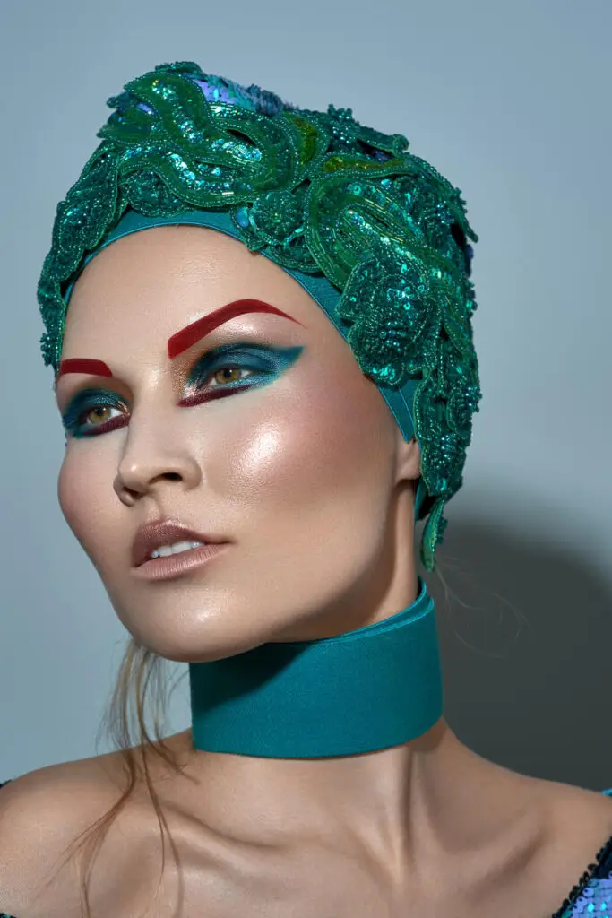 Makeup, headpiece by Roque Cozzette