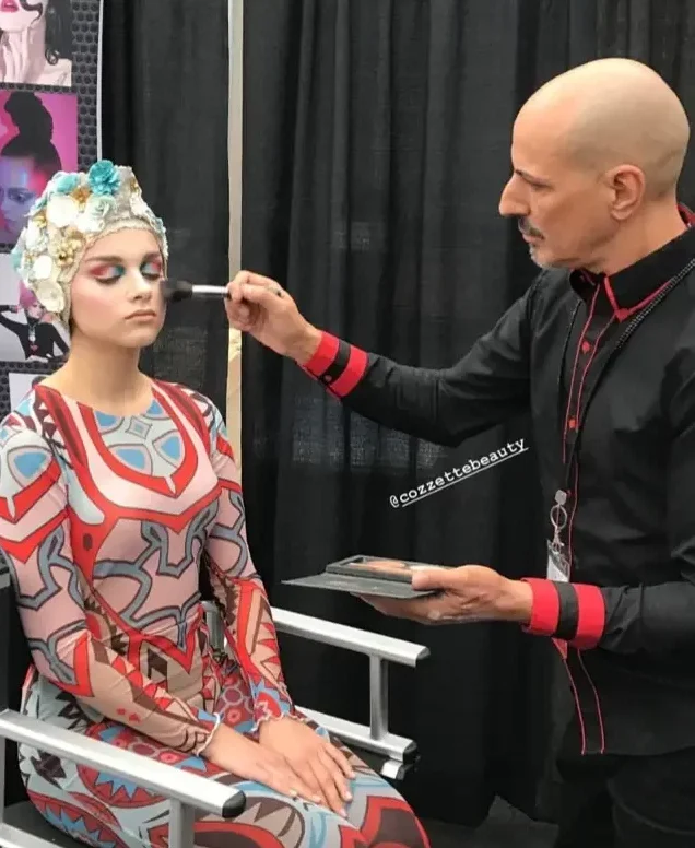 Roque Cozzette teaching makeup techniques at a seminar in Vancouver, Canada