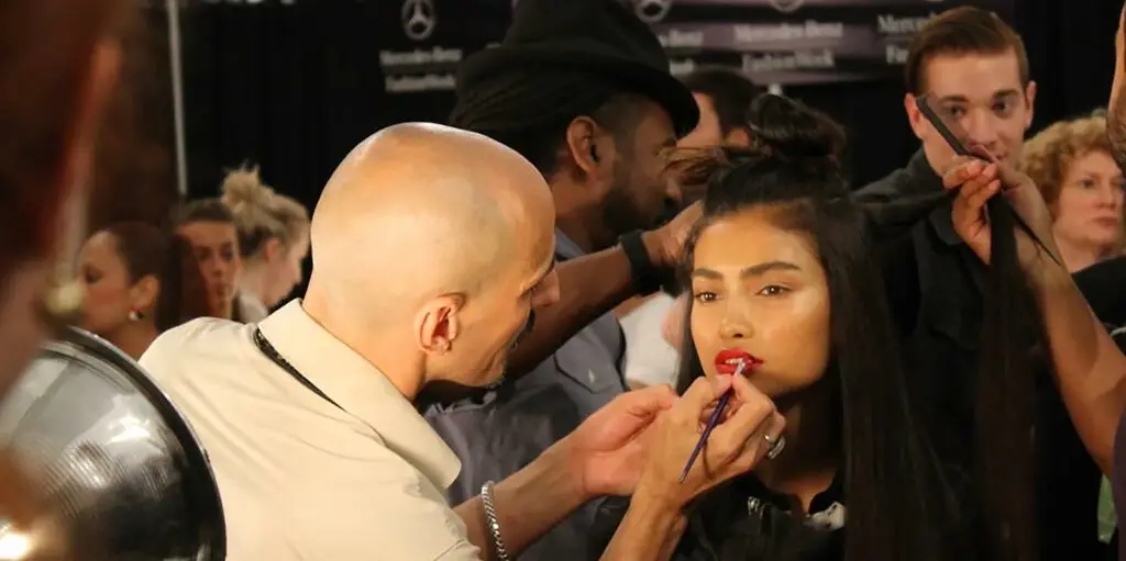 Roque Cozzette backstage at Reem Acra